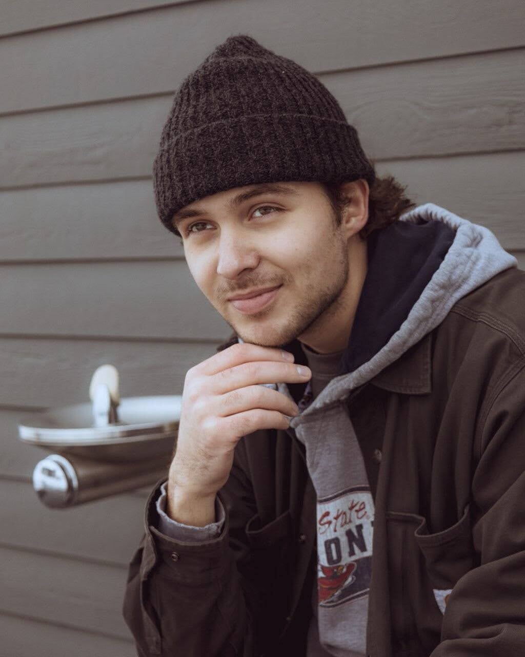 Portrait of Elijah in a beanie
